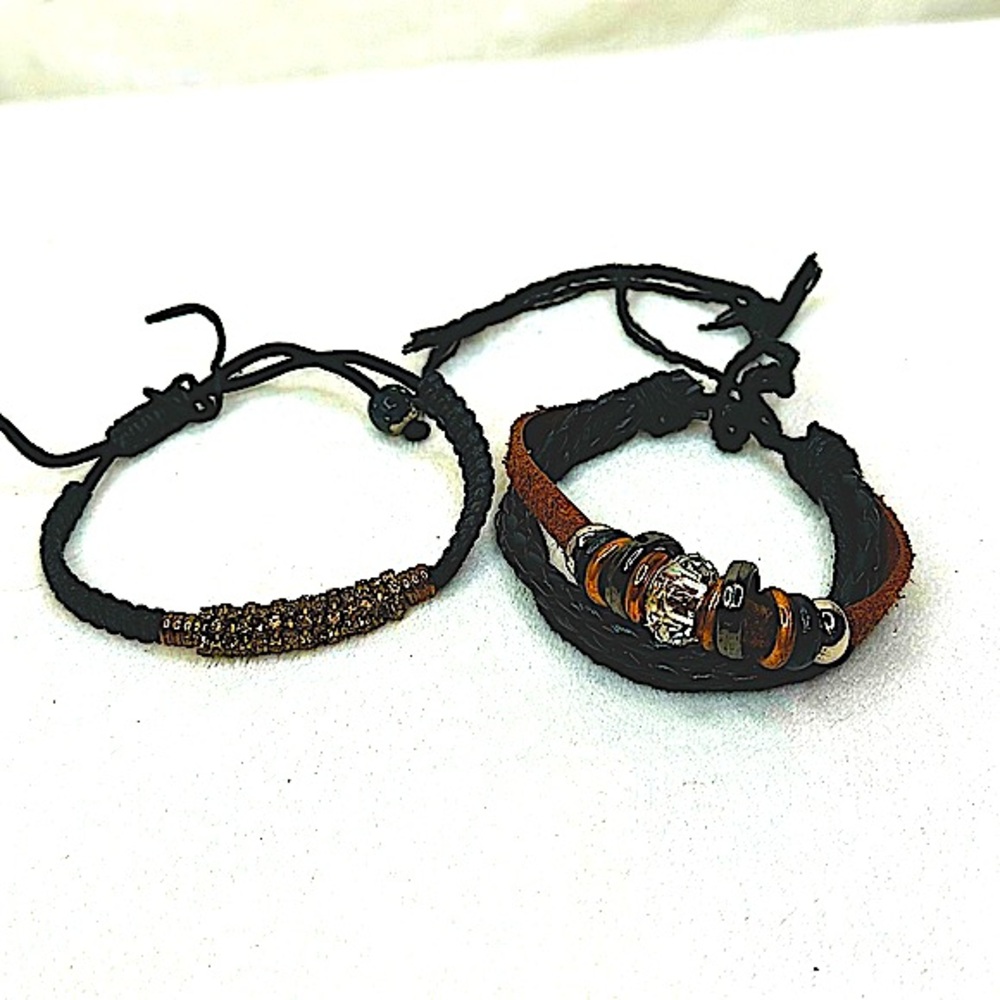 2 black braided bracelets with brass and crystal-like beading.